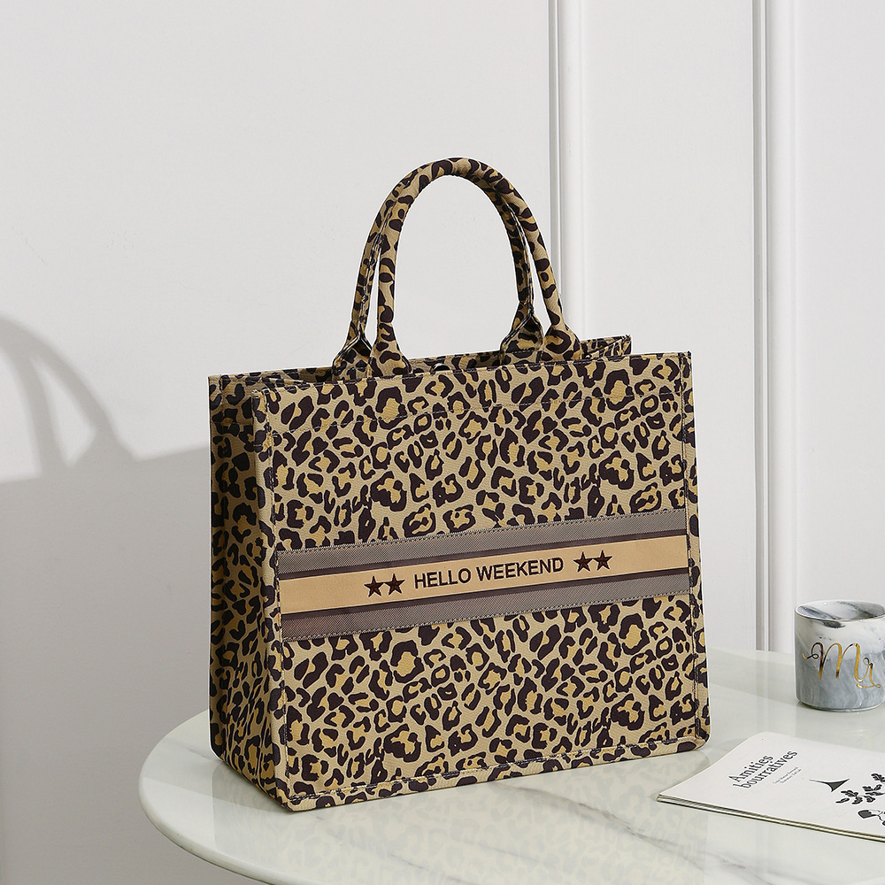 Marcas famosas de lujo, bolso de hombro de piel de leopardo de imitación para mujer, bolso de mano de gran capacidad con logotipo de decoración de correas